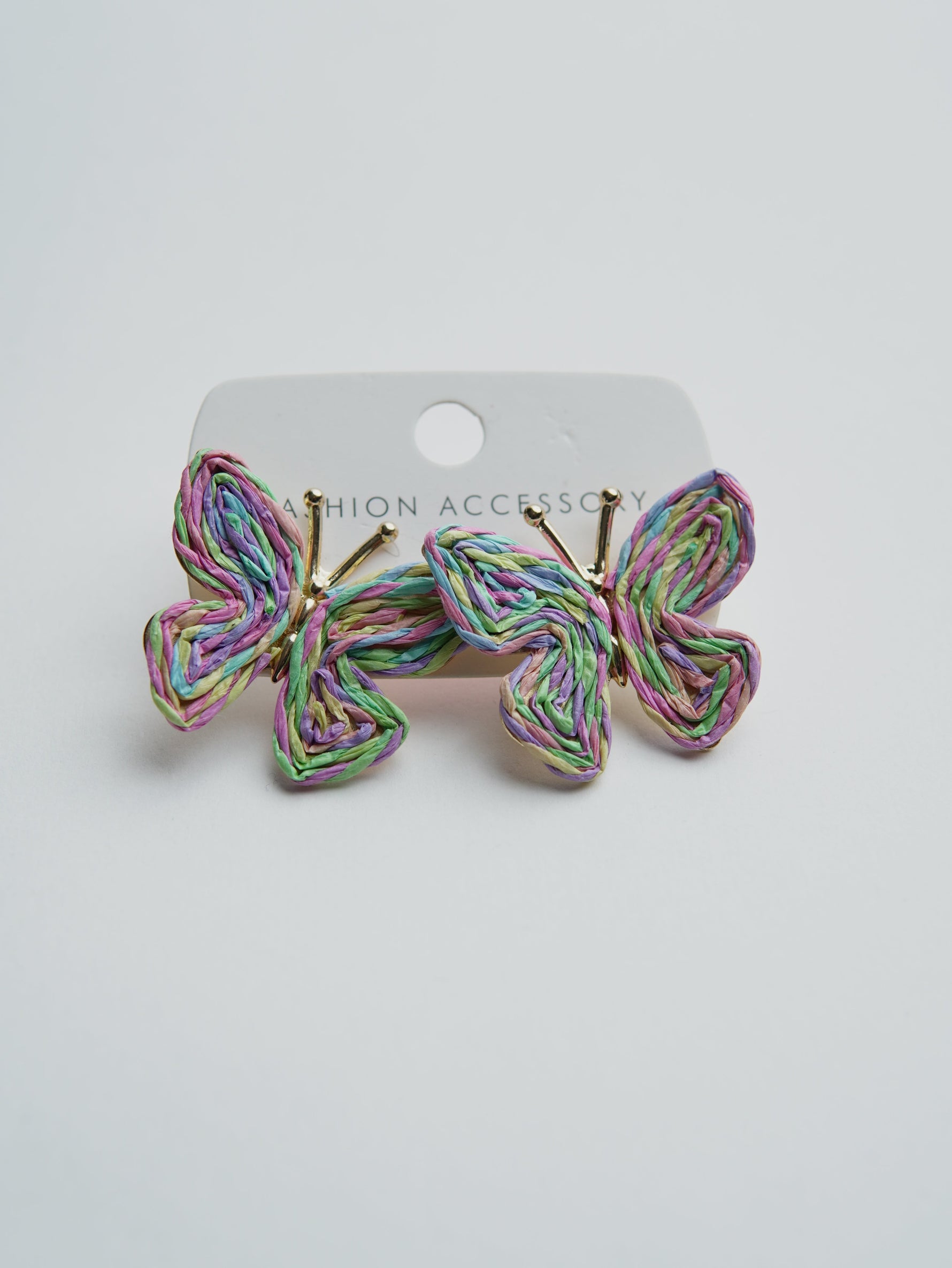 All Above Boutique pastel rainbow woven straw butterfly earrings with gold posts. Perfect for summer or boho style.