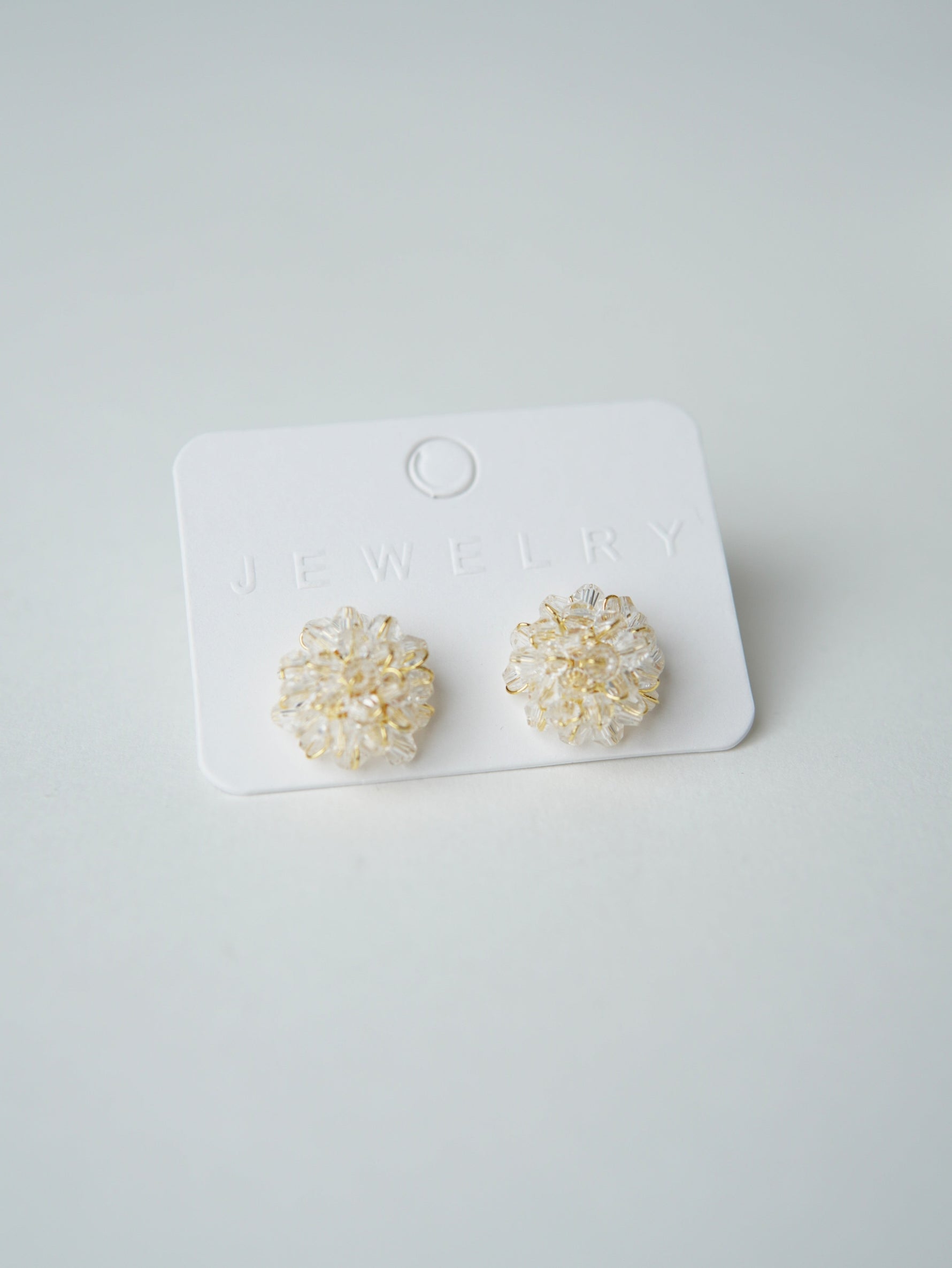 All Above Boutique delicate gold wire earrings with clear crystal cluster design, perfect for special occasions.