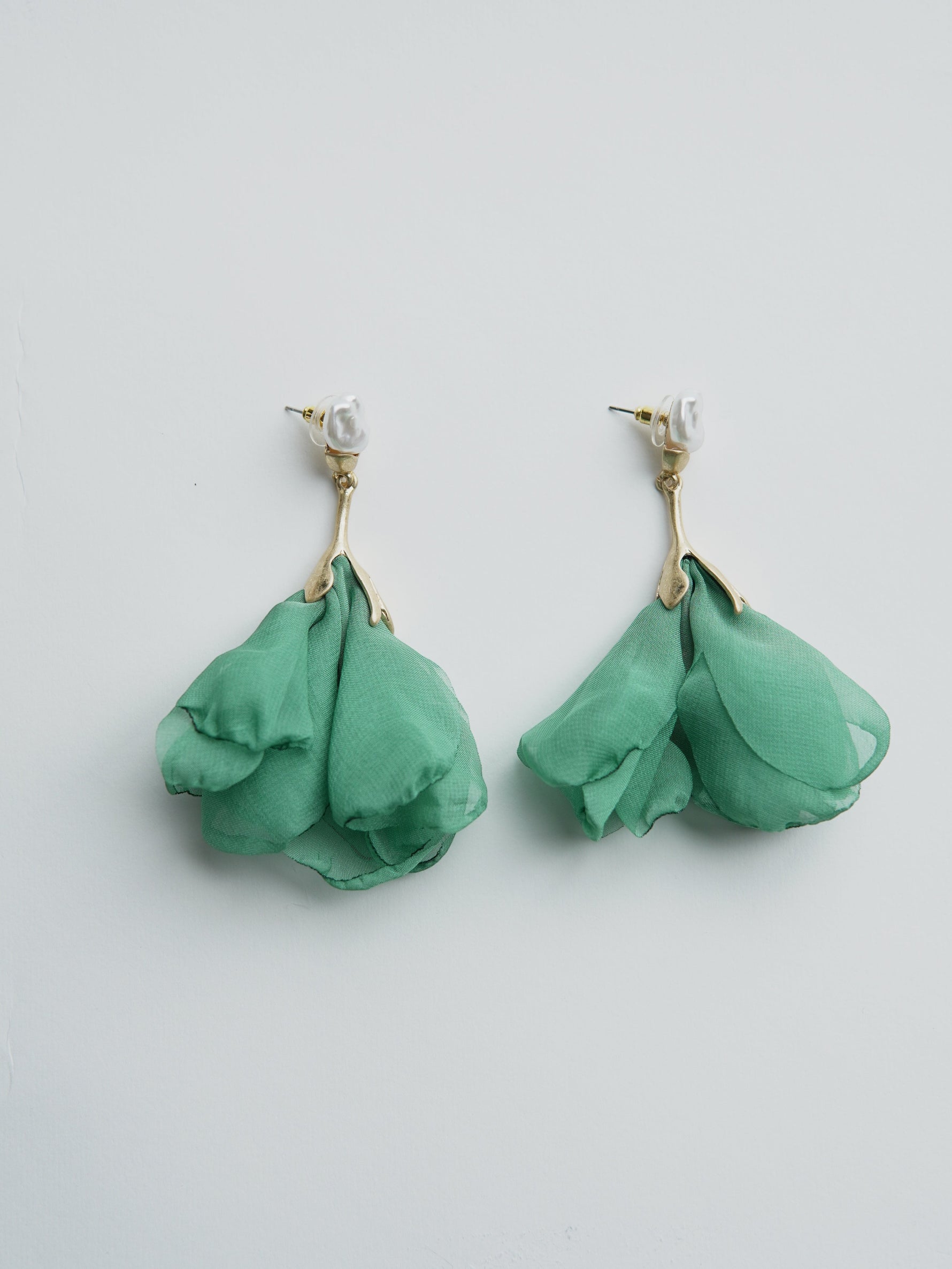 All Above Boutique green chiffon flower drop earrings with pearl accent. Stainless steel.