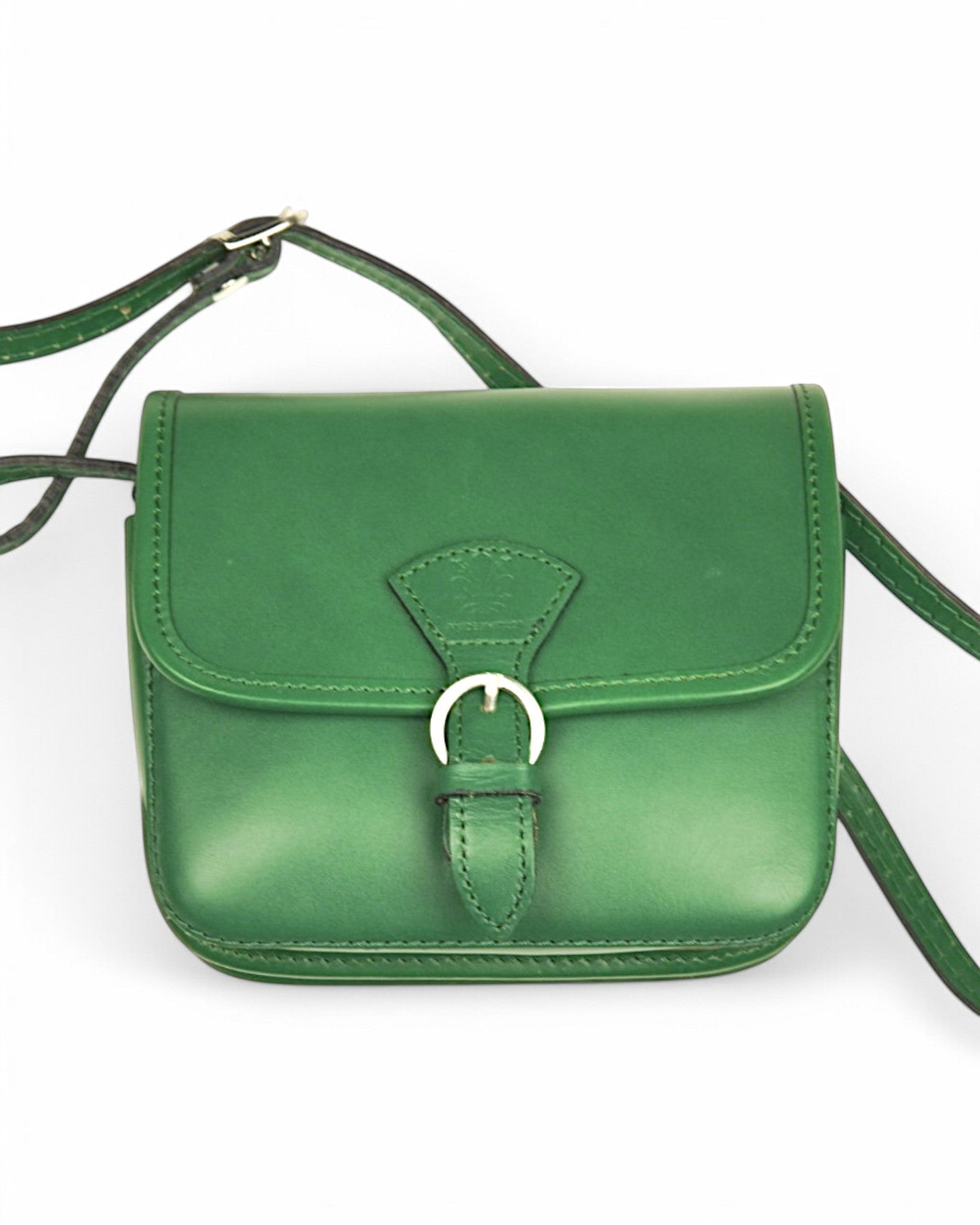 All Above Boutique green leather crossbody satchel with buckle closure and adjustable strap.