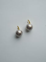All Above Boutique classic pearl drop earrings with stainless steel clasps, featuring large, lustrous synthetic pearls in a light grey hue.
