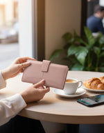 All Above Boutique women's leather wallet with multiple card slots and secure clasp closure, available in various colors.