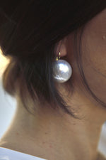 All Above Boutique large pearl drop earrings with stainless steel closure, elegant statement jewelry.
