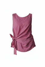 All Above Boutique pink linen sleeveless tie-waist top. Relaxed fit, ideal for summer.
