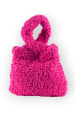 All Above Boutique pink teddy bear plush handbag with double handles and magnetic snap closure.