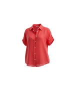 All Above Boutique red rayon relaxed fit shirt with cuffed short sleeves and front buttons, paired with dark teal wide-leg pants.