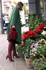 All Above Boutique red teddy fabric handbag with double handles, magnetic snap closure, and a soft, fluffy texture.
