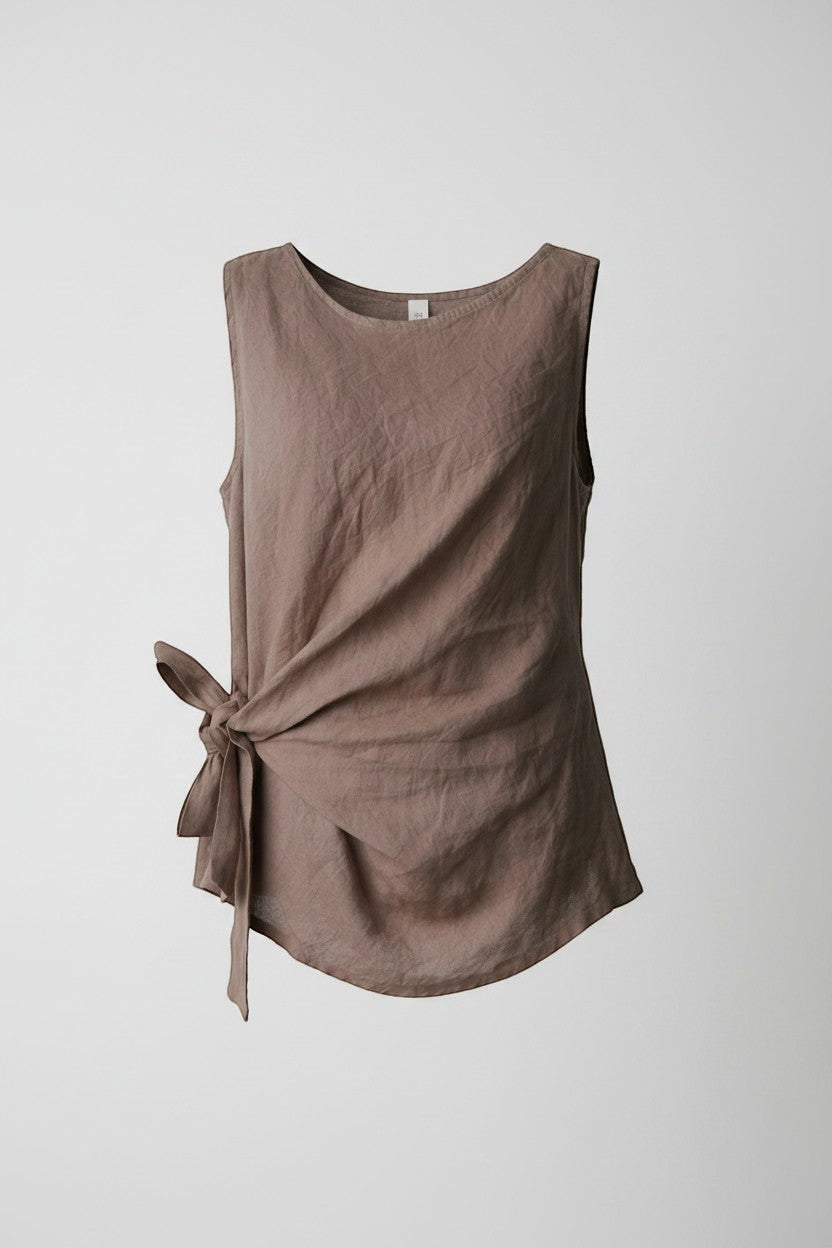 All Above Boutique taupe linen sleeveless tie-waist top. Relaxed fit, breathable, and perfect for warm weather.