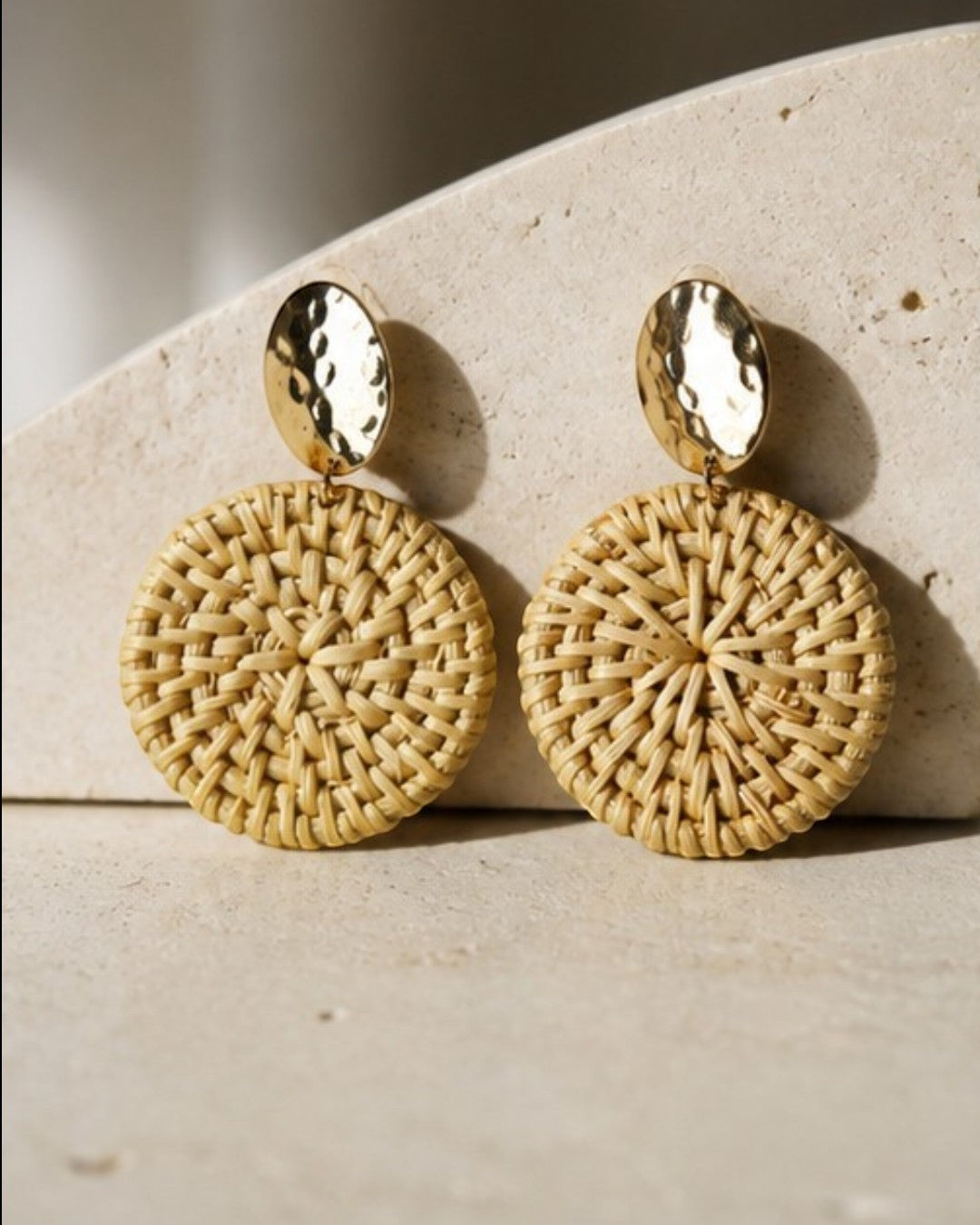 All Above Boutique natural woven wood round statement earrings with hammered gold tops.