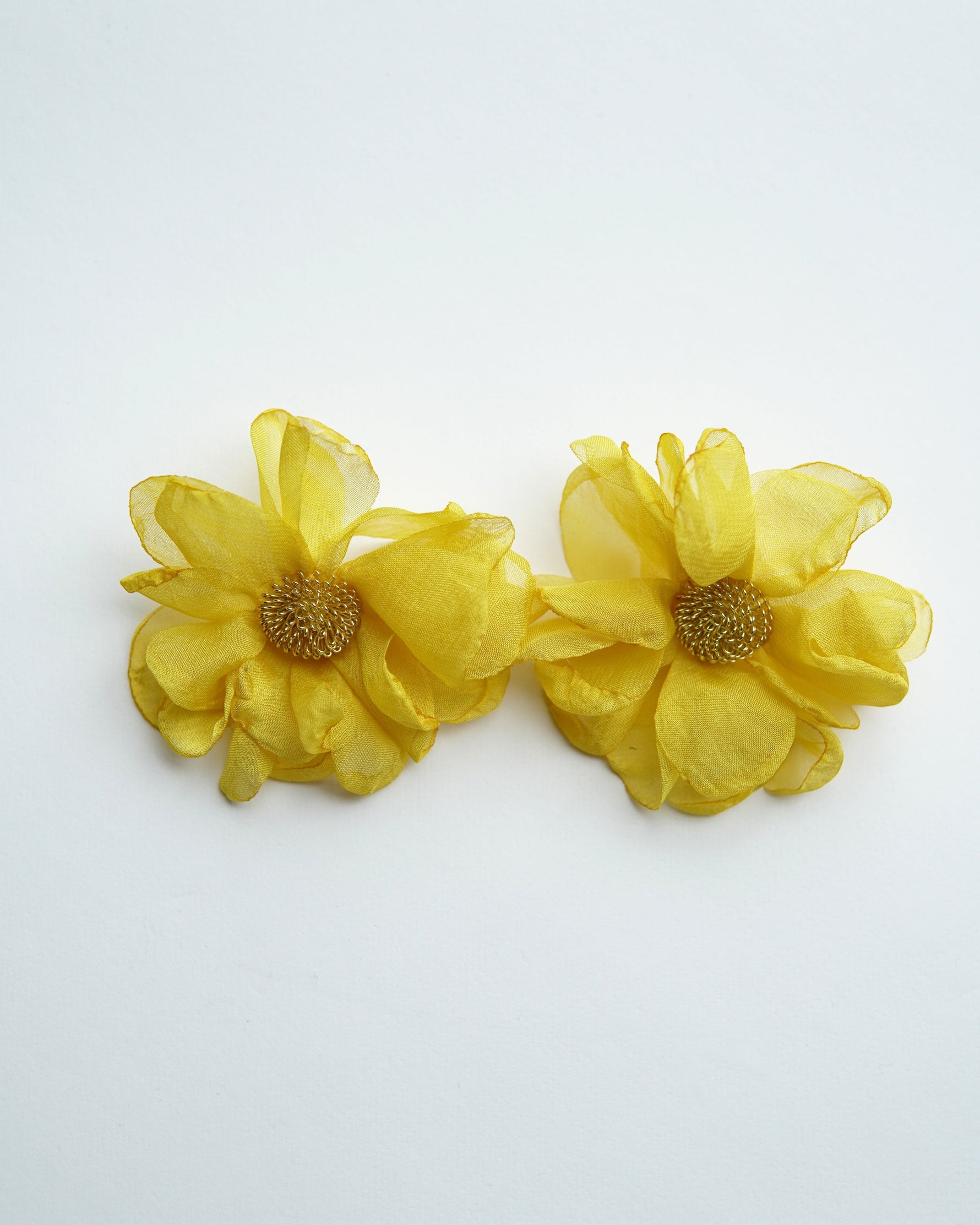 All Above Boutique yellow fabric flower earrings with beaded centers, delicate and romantic design.
