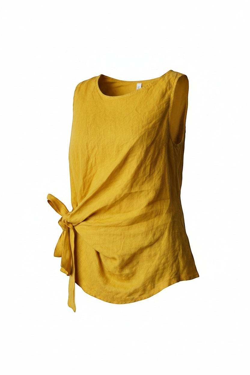 All Above Boutique mustard yellow linen sleeveless top with a tie knot detail at the waist and a relaxed fit.