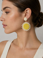 All Above Boutique yellow and white straw daisy flower statement earrings