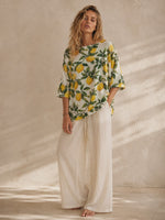 Bluză damă vaporoasă cu imprimeu floral și croială elegantă