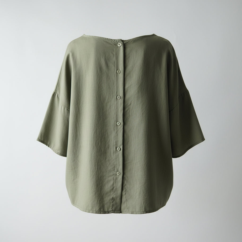 Bluză oversize verde cu nasturi la spate, design modern