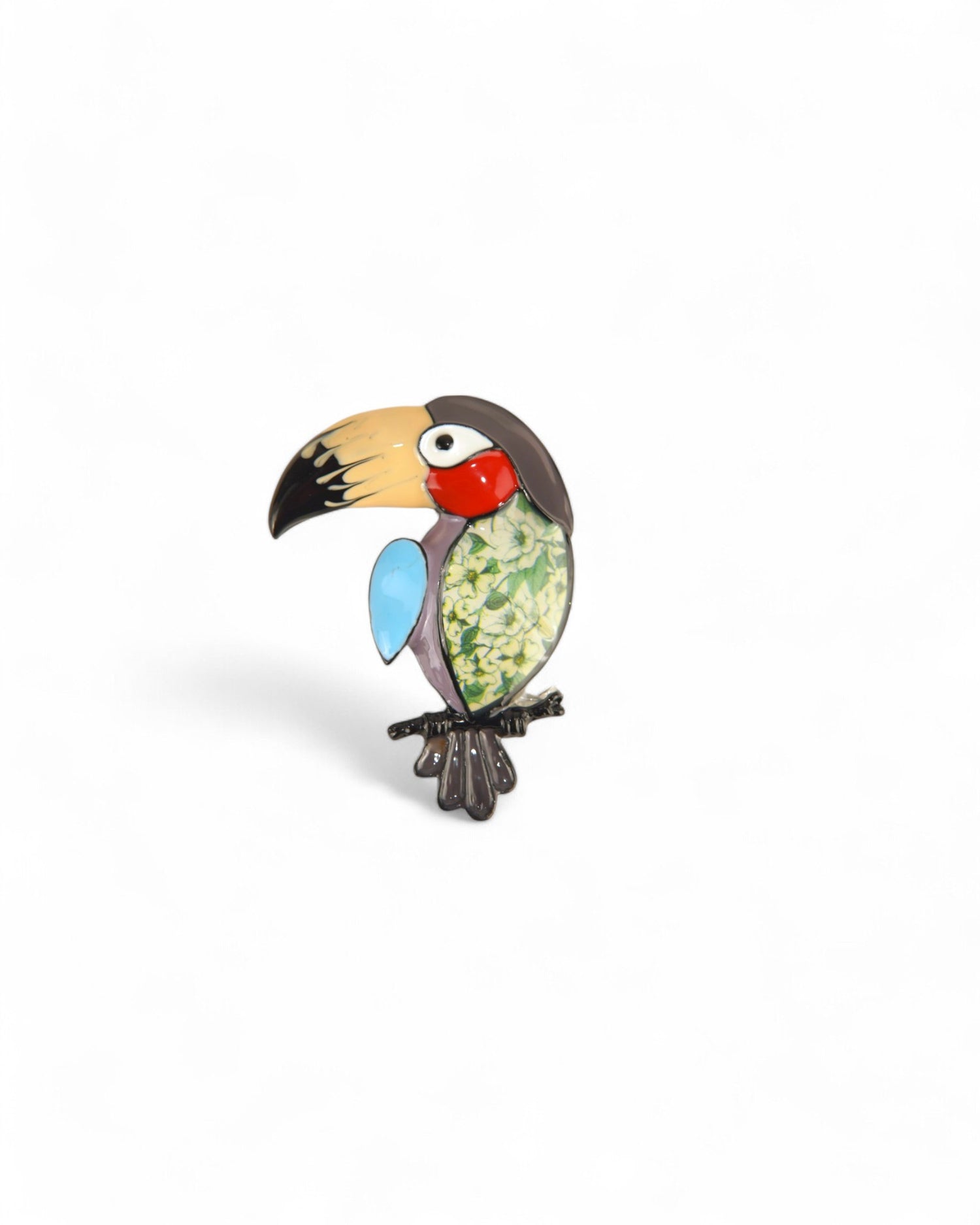 Broșă portocalie tucano, cu accente vibrante și detalii florale.