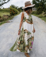 Rochie Amalfi din in floral vedere laterală, lungime maxi, purtată cu pălărie, All Above Boutique