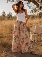 Detaliu imprimeu floral roz și crem pantaloni evazați din in natural, All Above Boutique