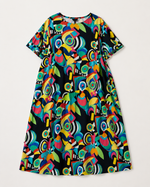 Rochie din bumbac cu imprimeu multicolor, detaliu croială și textură — All Above Boutique.