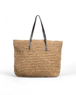 Geantă natur tip shopper, împletită din paie, vedere frontală, cu mânere din piele.