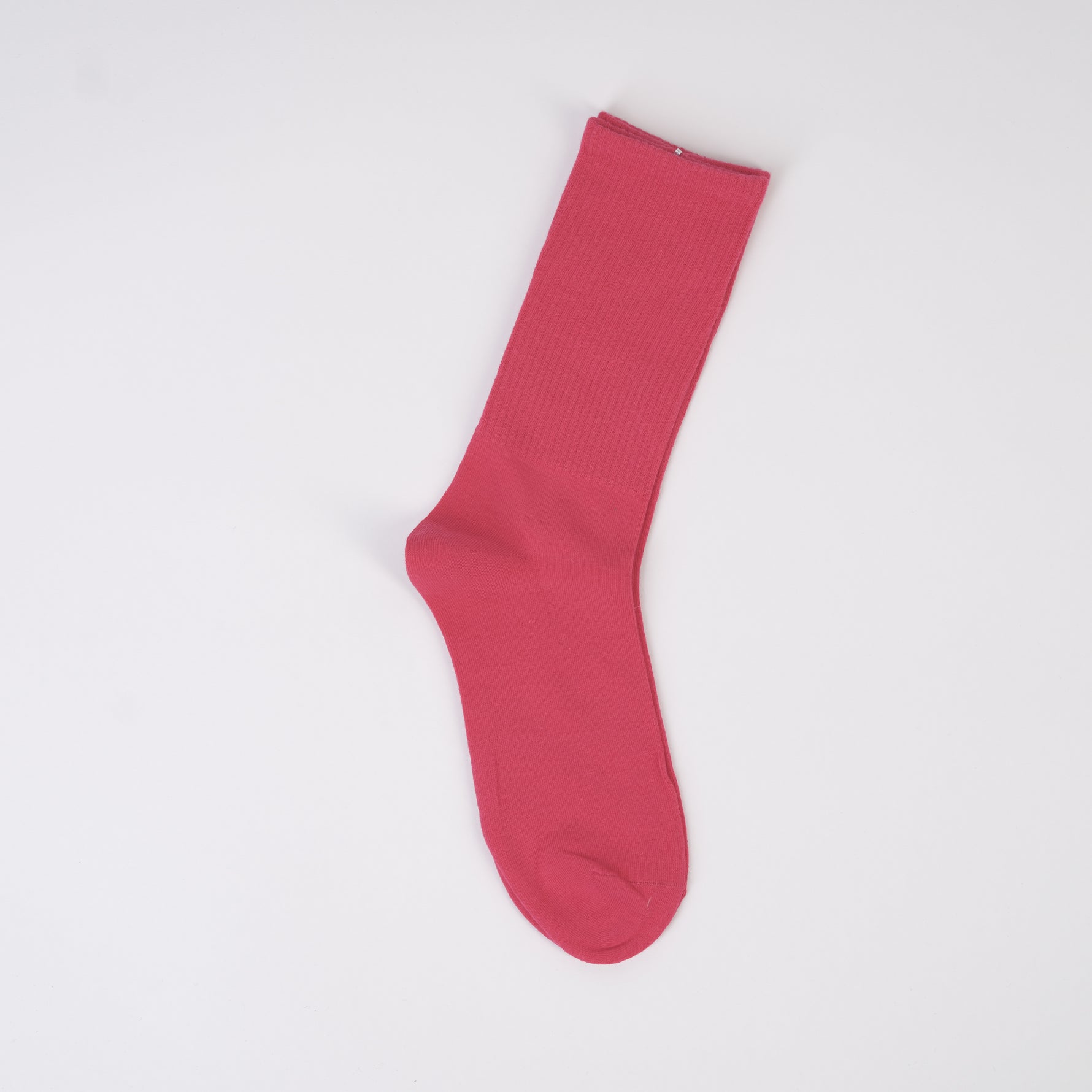Șosetă roz închis, din bumbac elastic și neted.