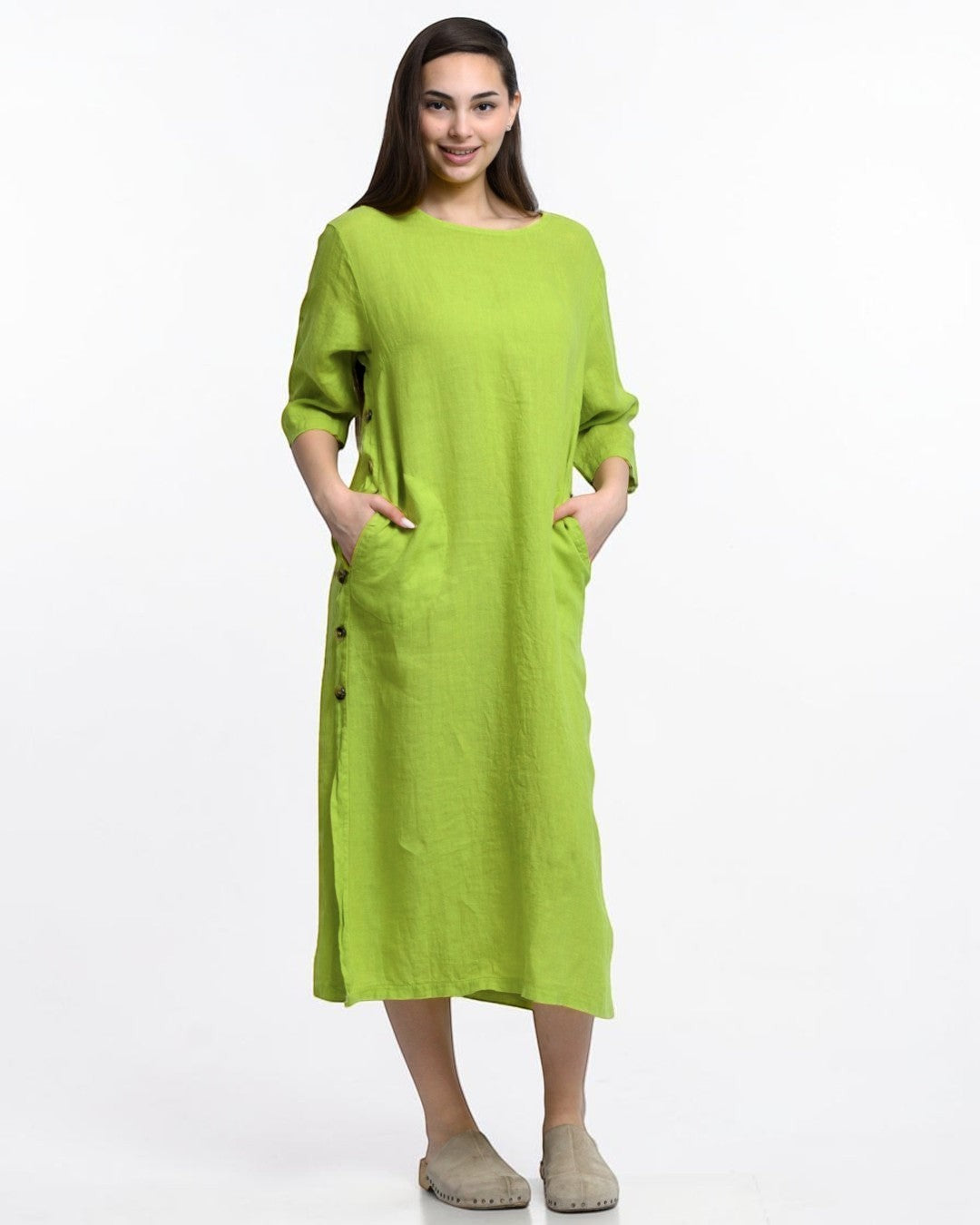 All Above Boutique lime green linen midi dress with side buttons and pockets. 3/4 sleeves and crew neck.