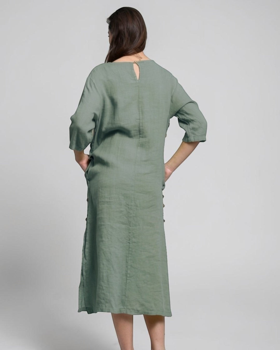 All Above Boutique sage green linen midi dress with 3/4 sleeves and side button detail